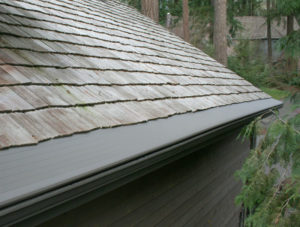 Gutter guard on a shingle roof